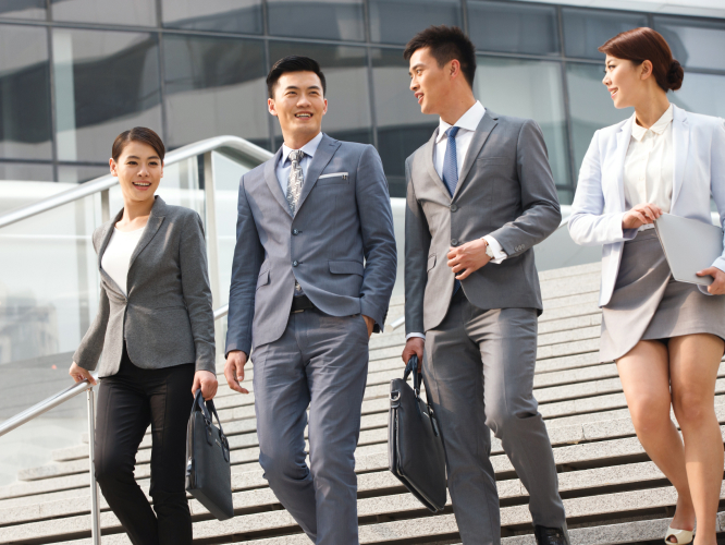 Colleagues walking down the stairs